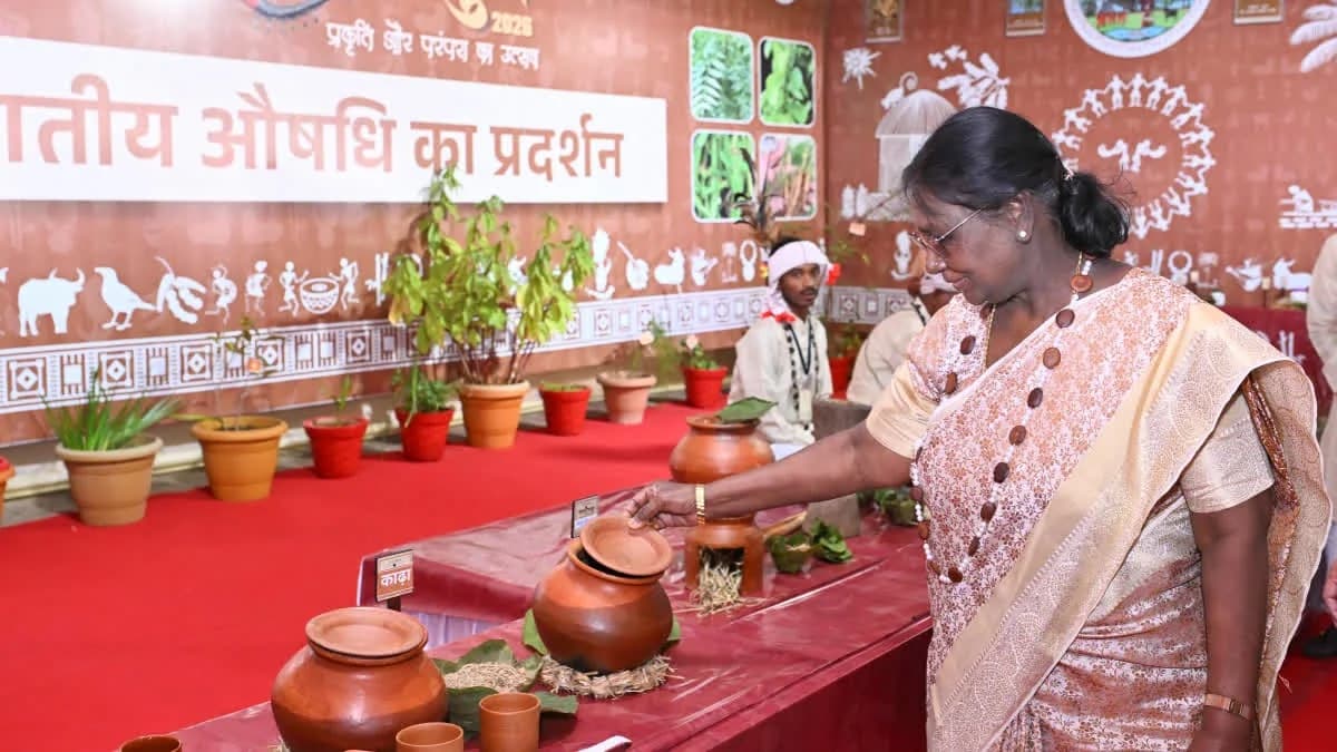 President Droupadi Murmu at the tribal-medicine display during Bastar Pandum 2026