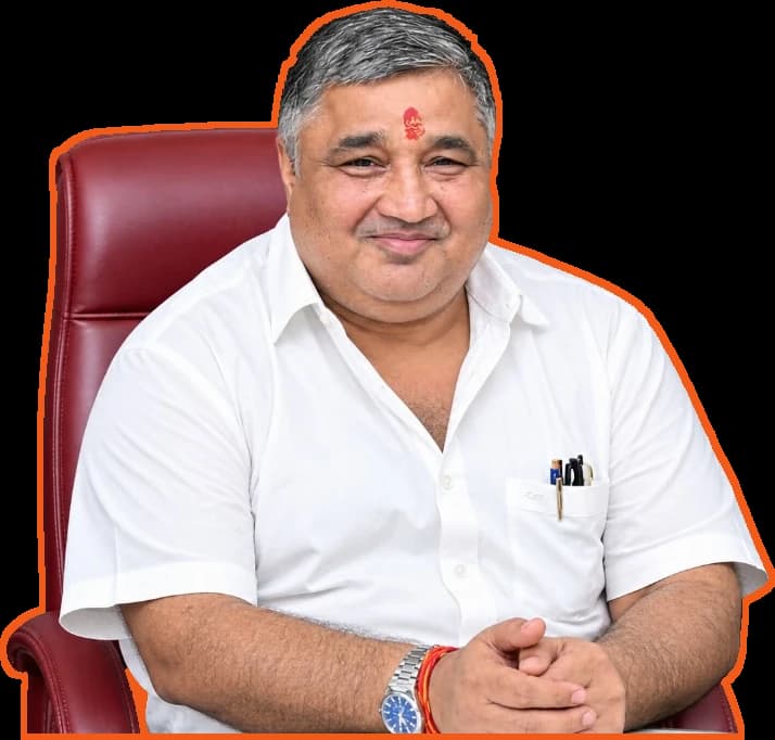 Rajesh Agrawal seated in his office chair